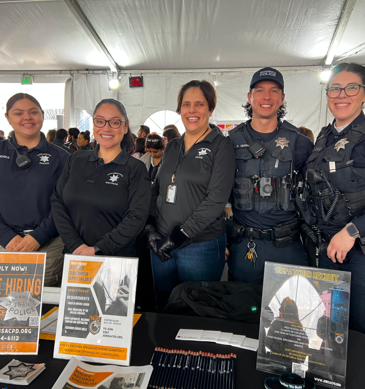 officers at a booth