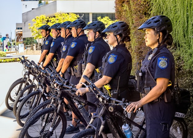 officers standing with their bikes