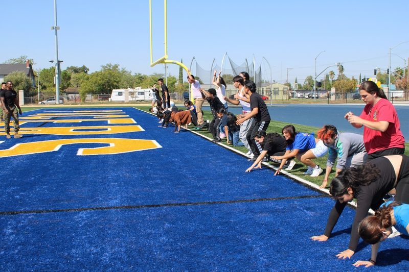 students preparing to race